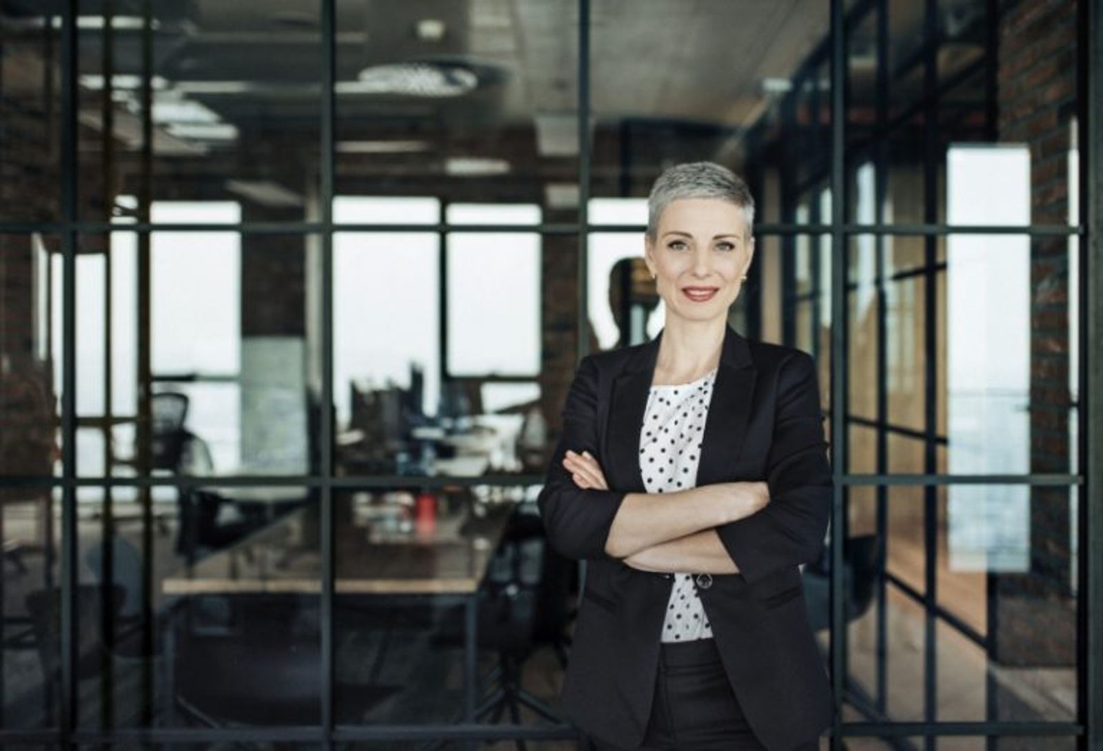 Women standing in front of an office