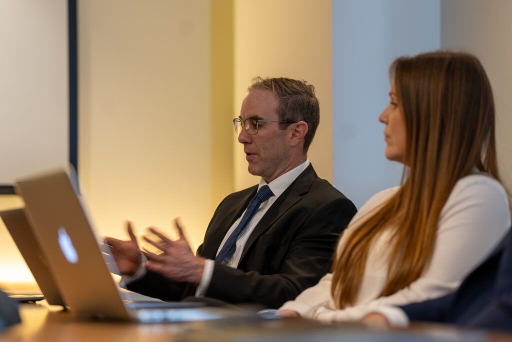 Advisors reviewing market research