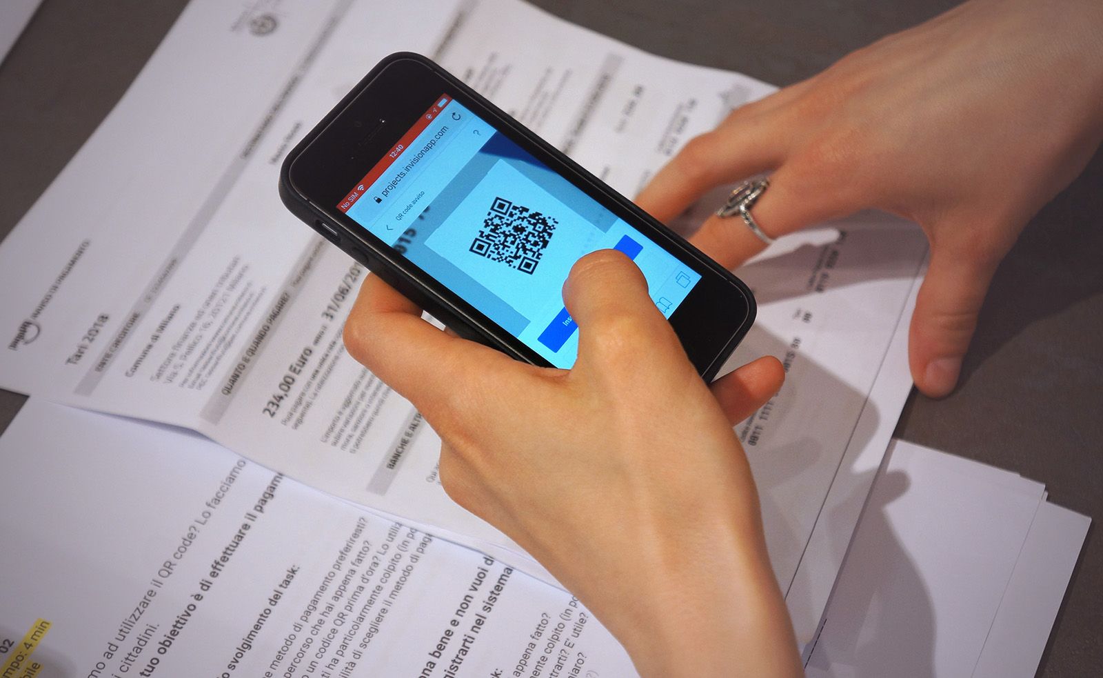 Scanning the QR code on the paper bill to start the payment flow