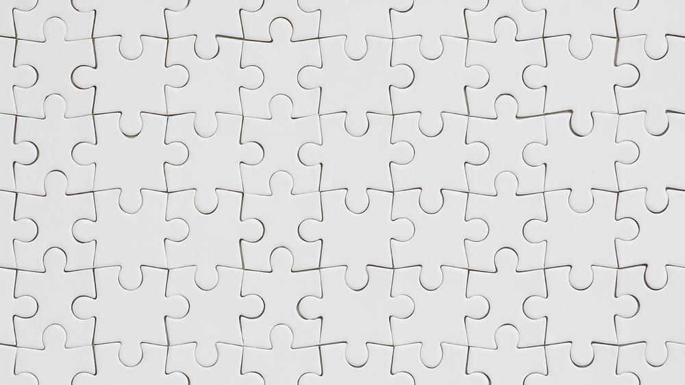 blank puzzle pieces fitting together