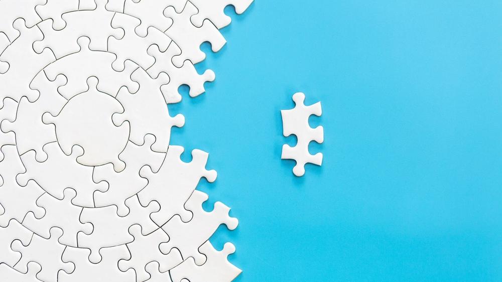 Puzzle piece fitting into others