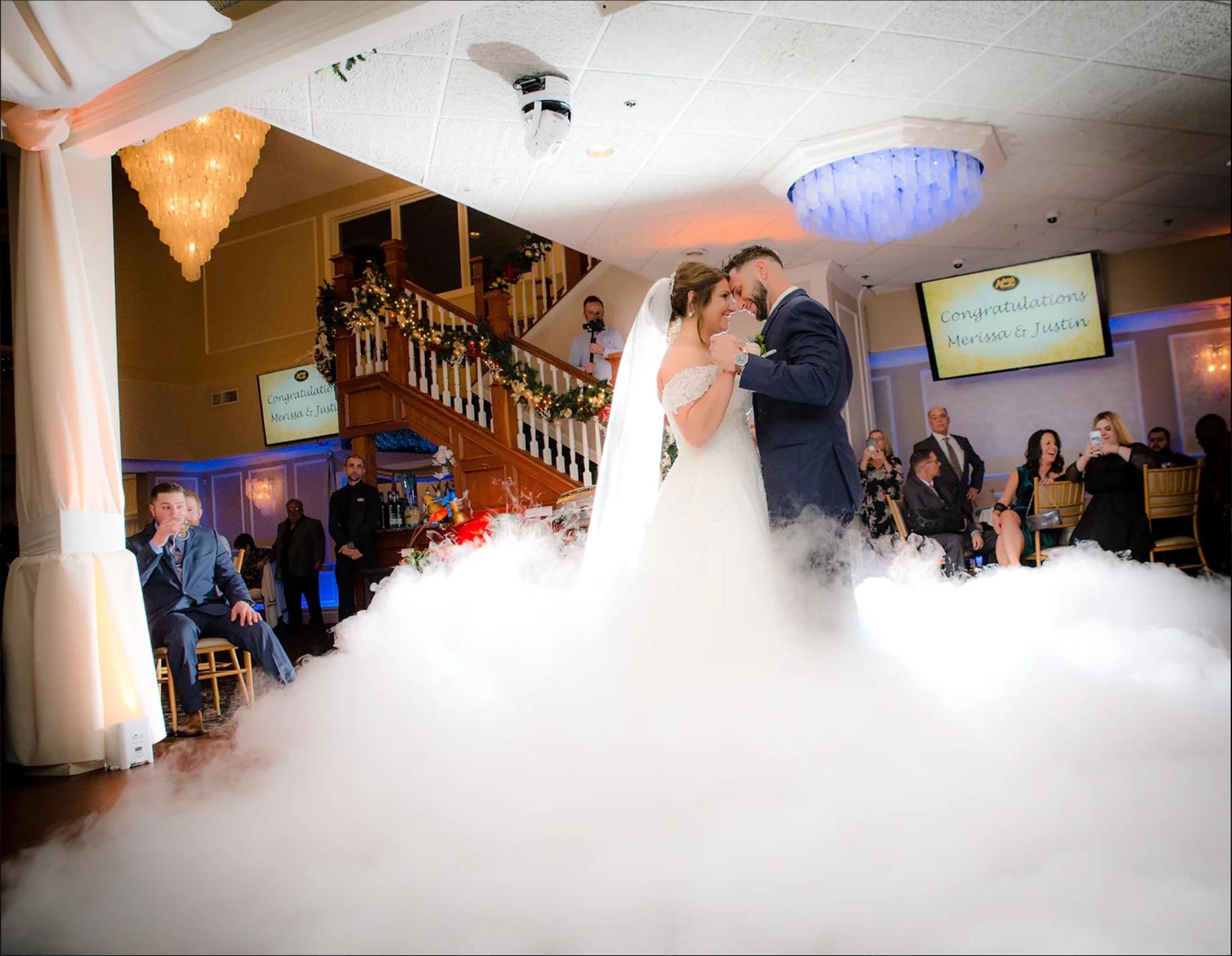 Bride and groom on a packed wedding dance floor in Connecticut