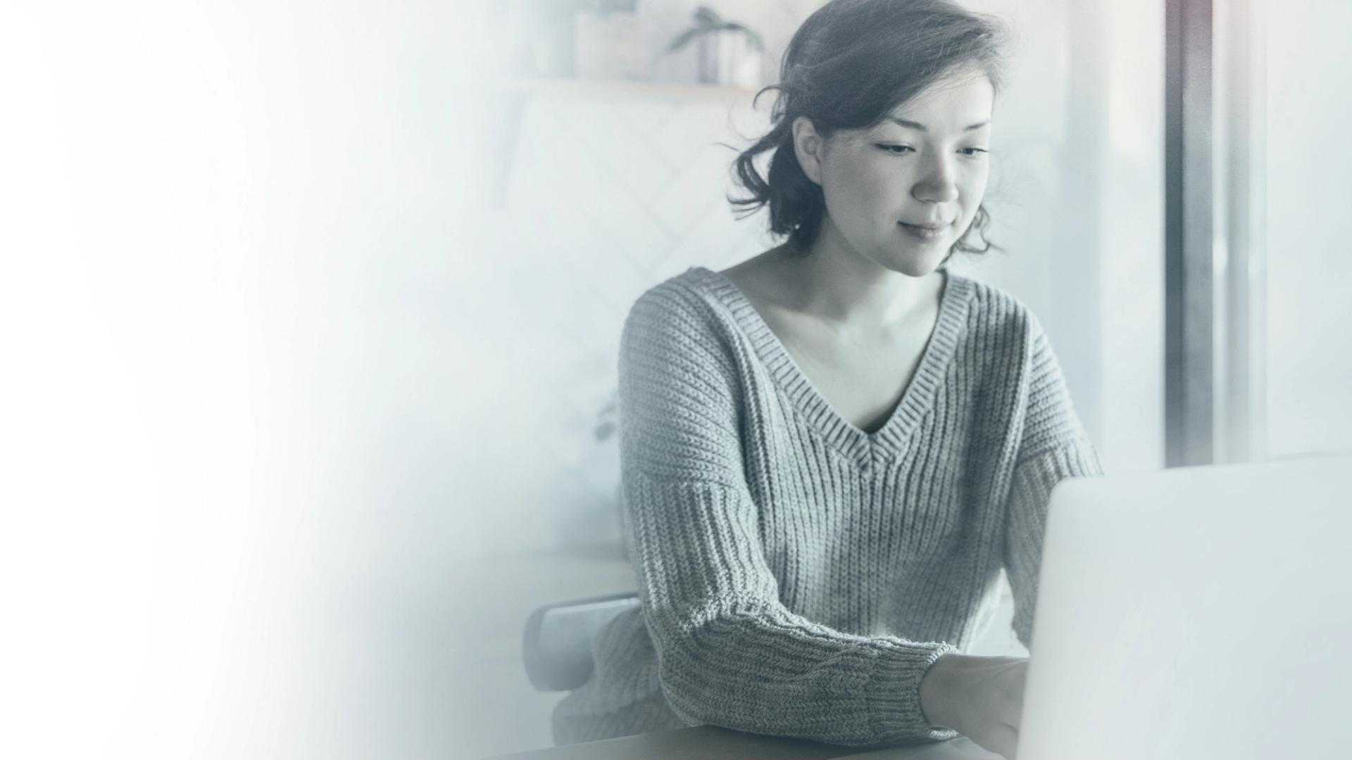 Lady typing on laptop