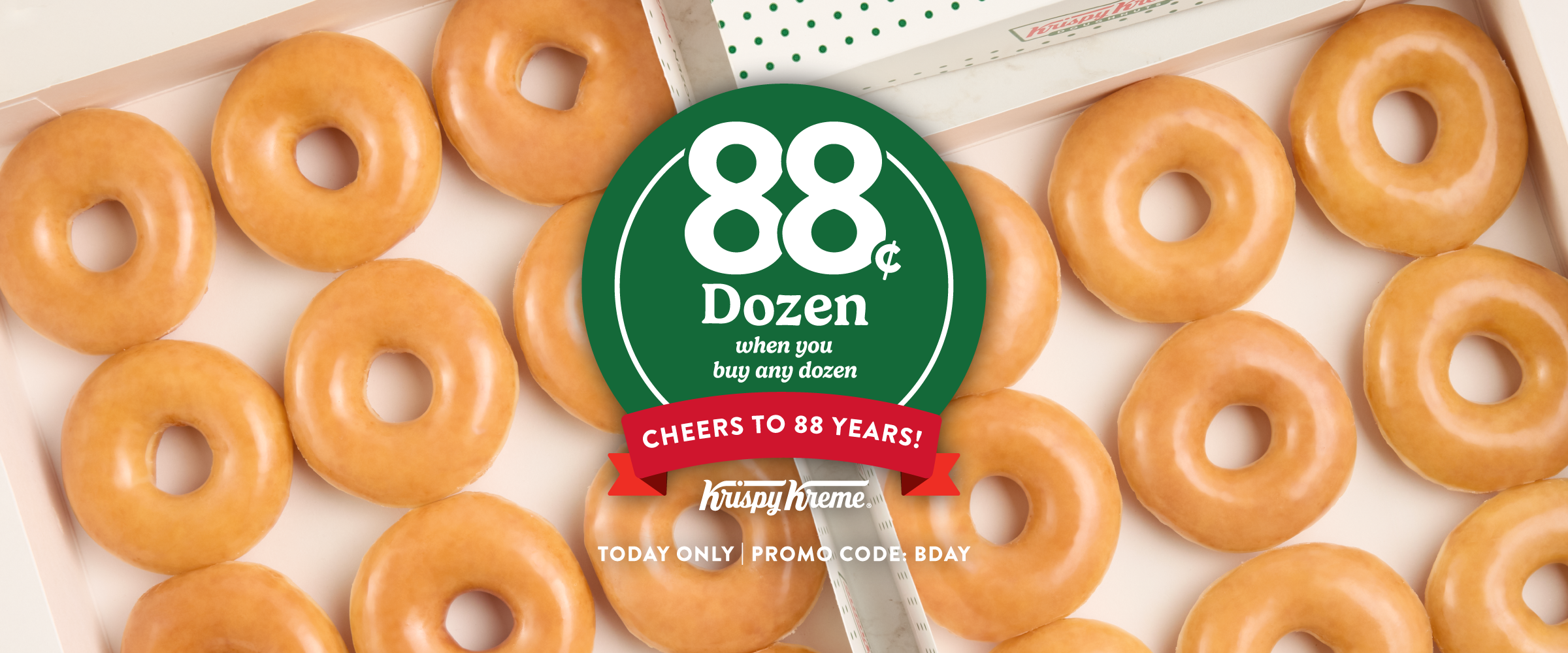 Box of Krispy Kreme Original Glazed® doughnuts with a green circle in the center displaying “88¢ Dozen when you buy any dozen,” and a red ribbon banner reading “Cheers to 88 Years!” Includes Krispy Kreme logo and text “Today Only | Promo Code: BDAY.”