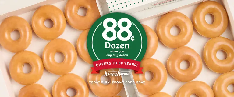 Box of Krispy Kreme Original Glazed® doughnuts with a green circle in the center displaying “88¢ Dozen when you buy any dozen,” and a red ribbon banner reading “Cheers to 88 Years!” Includes Krispy Kreme logo and text “Today Only | Promo Code: BDAY.”