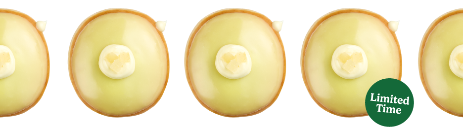 Experience the perfect blend of citrus and sweetness with the Limone Delight Doughnut. This unglazed shell doughnut is filled with a tangy lemon delight flavored Kreme™, dipped in zesty lemon-flavored icing and finished with a candied lemon. In every bite you’ll enjoy the bright and refreshing flavor of limone, making it the perfect treat to add a burst of sunshine to your day.