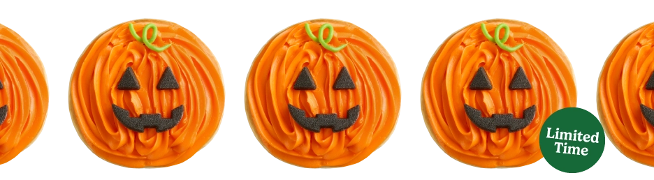 Jack-O-Lantern Doughnut from Krispy Kreme Halloween Doughnuts - shell doughnut with orange colored buttercreme and sugar piece eyes and mouth