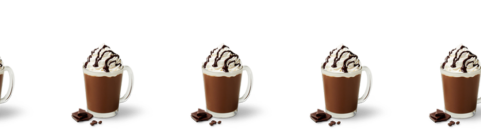 Multiple Mocha lattes with whipped cream and chocolate on top