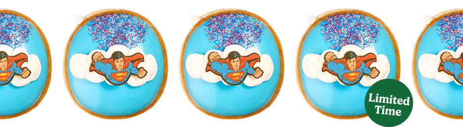 Superman™ Doughnut filled with white Kreme™, topped with light blue icing, buttercreme clouds, Superman™ piece, and themed sprinkles