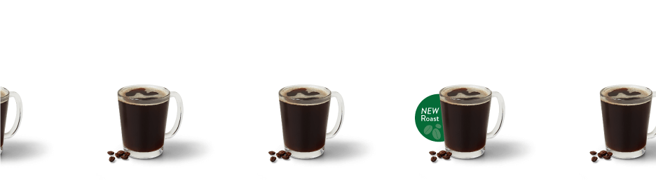 Multiple glass mugs of black coffee 