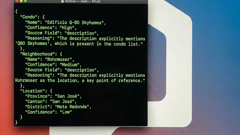 computer screen with a terminal window open that has json code