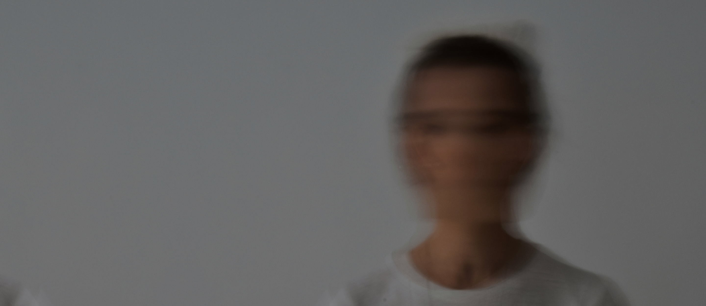 An image of a person whose identity is obscured