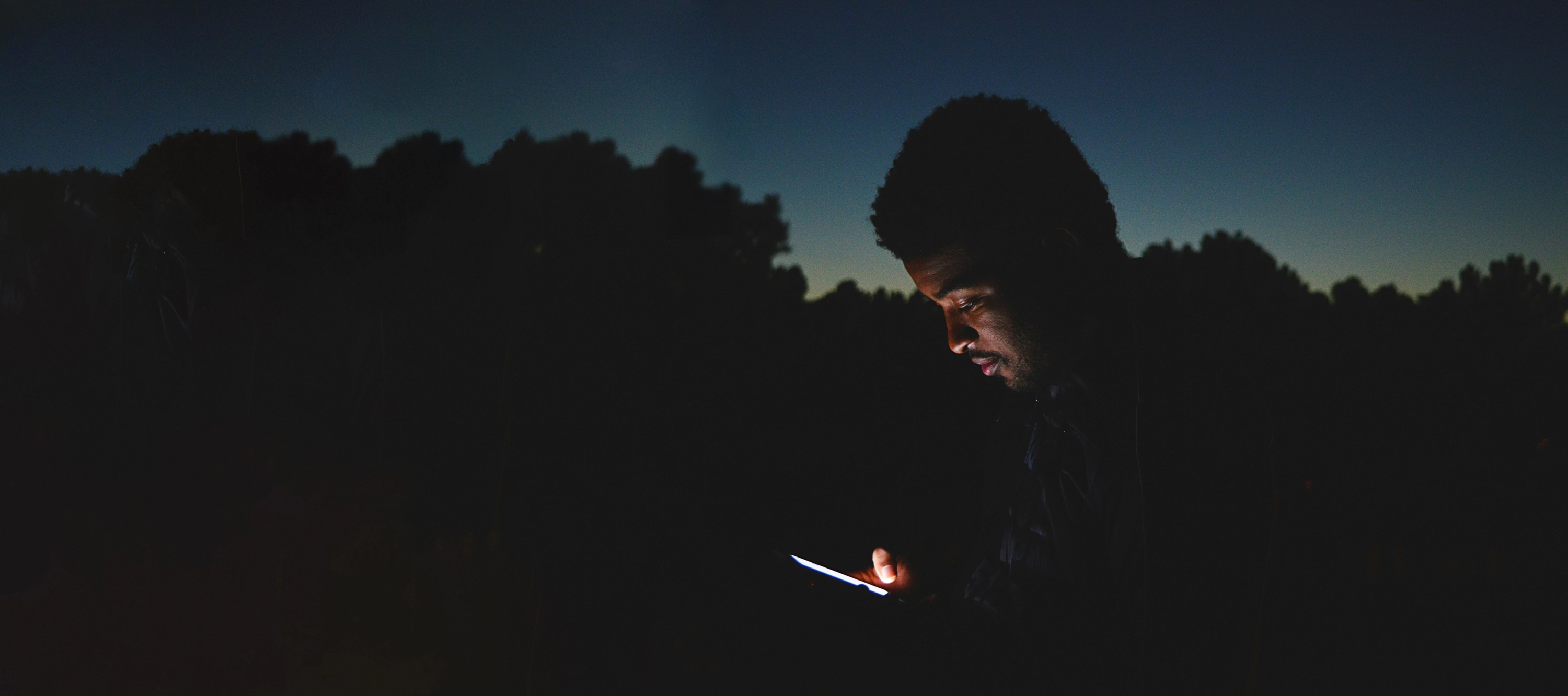 An image of a person holding a phone
