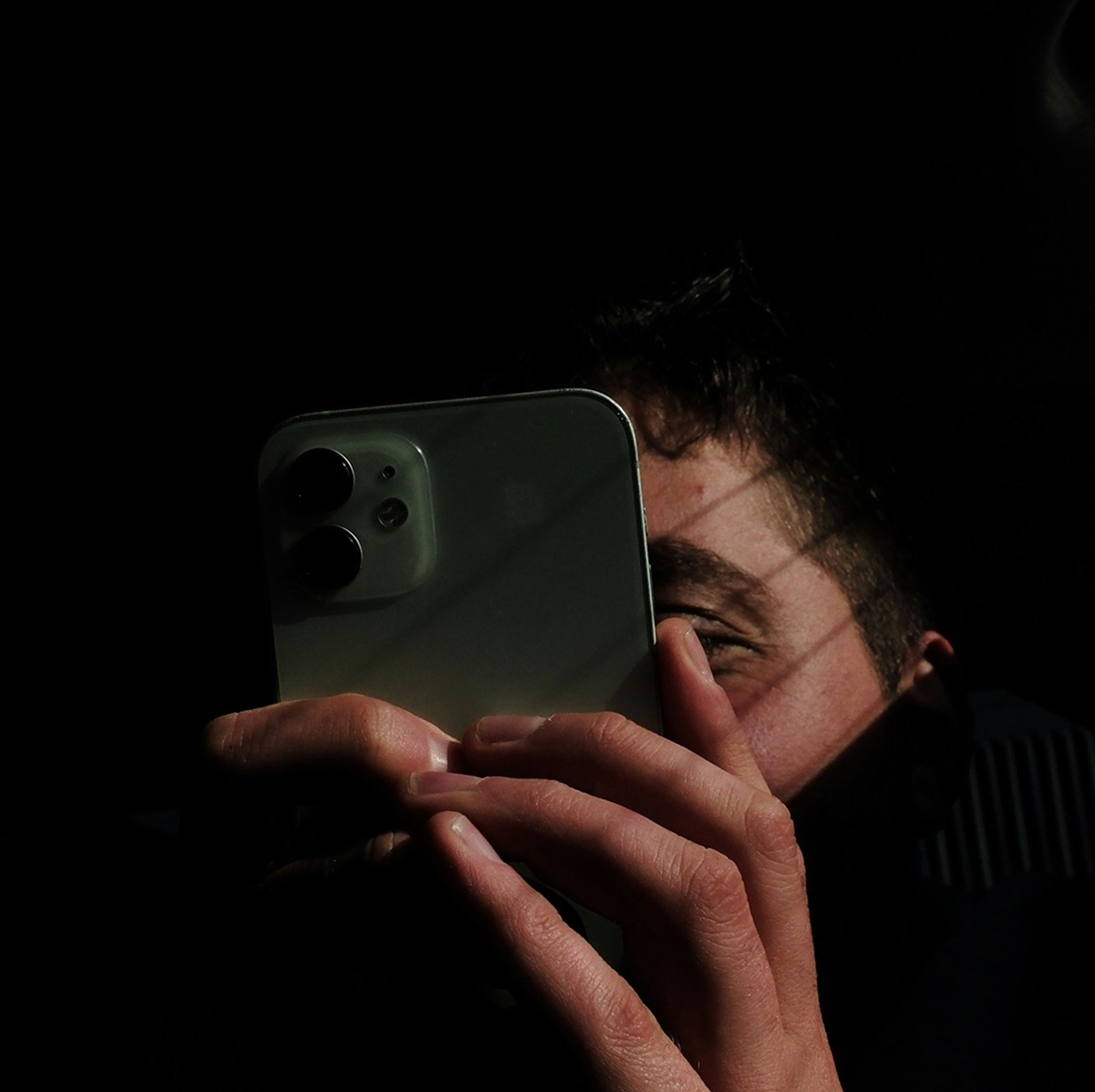 An image of a person holding a phone