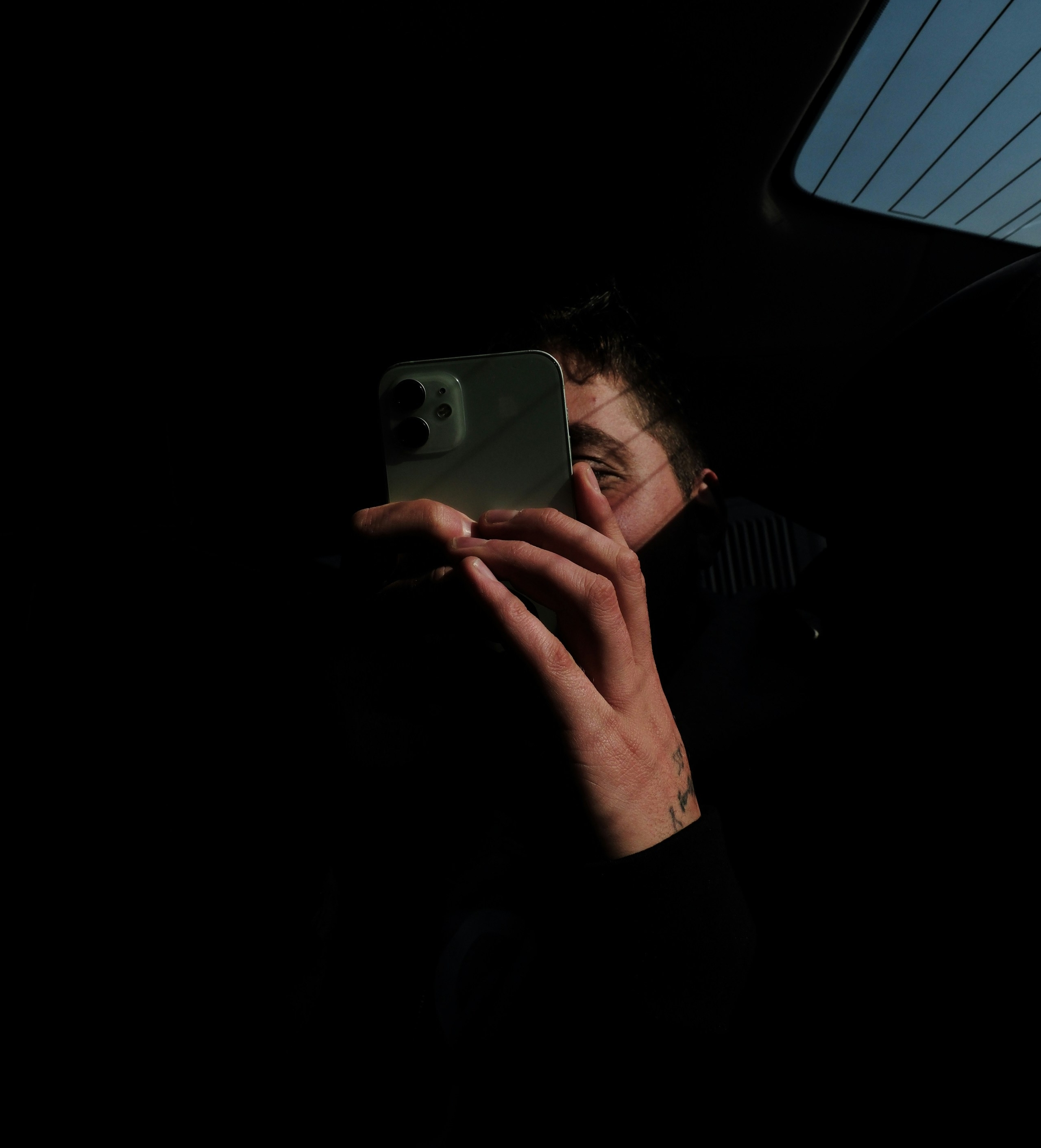 An image of a person holding a phone