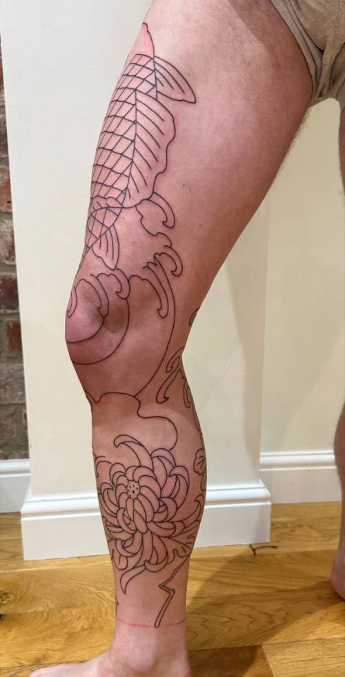 Right leg outline from the side, with waves around the knee and the chrysanthemum on the calf