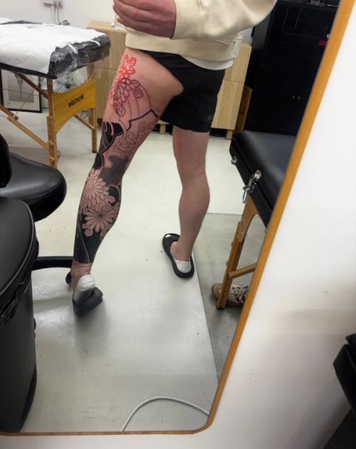 Studio mirror with the new chrysanthemum drawn in red on the hip, before the lines went in