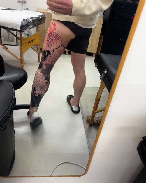 Studio mirror with the new chrysanthemum drawn in red on the hip, before the lines went in