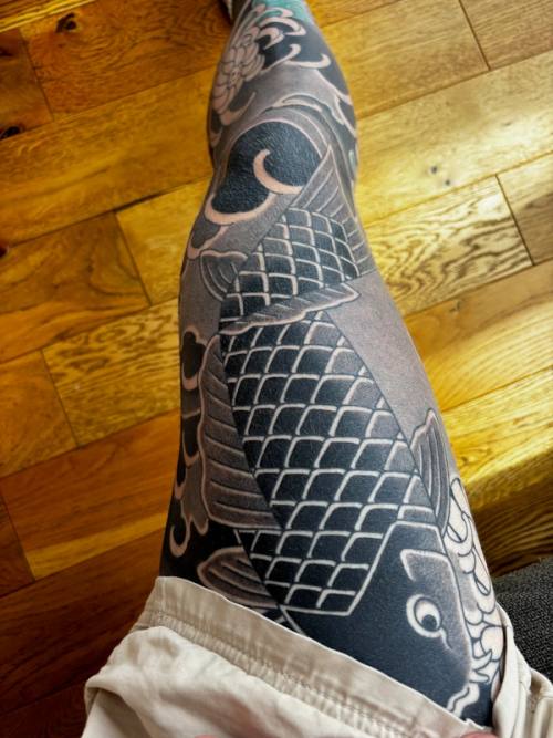 Koi scales on the thigh from above, healed and settled