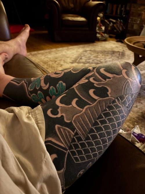 Legs up on the sofa, the shaded knee and chrysanthemum settling