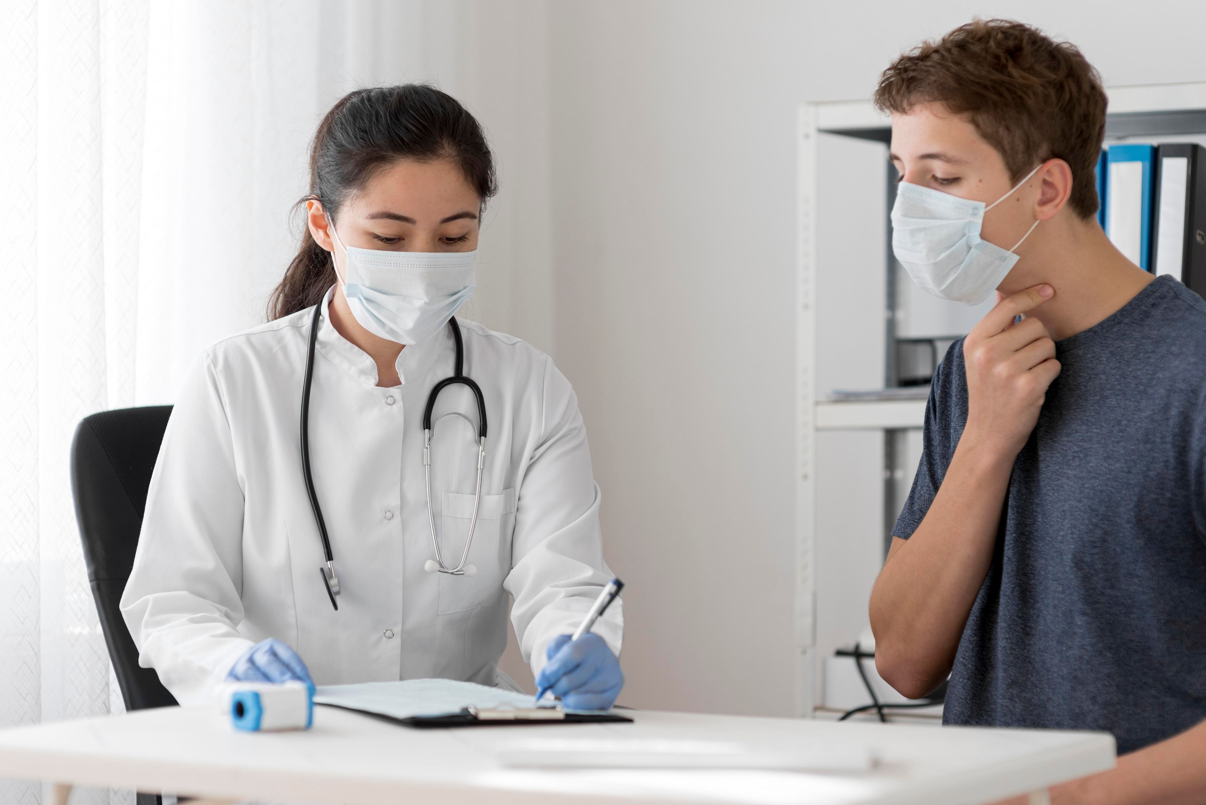 Healthcare provider consulting with a patient during a medical appointment, reviewing health information, symptoms, and personalized treatment recommendations