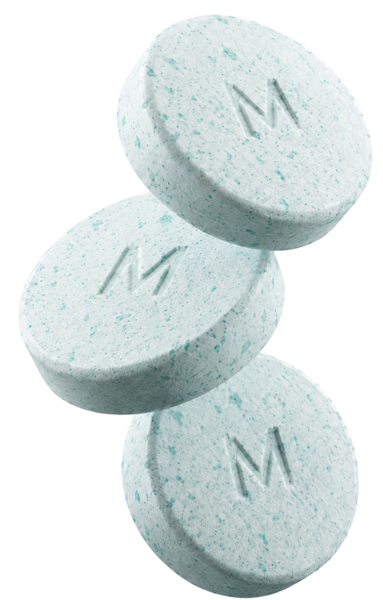 Three branded Matrix Reformed tablets stacked in a balanced arrangement, representing personalized wellness, daily health support, and precision treatment solutions