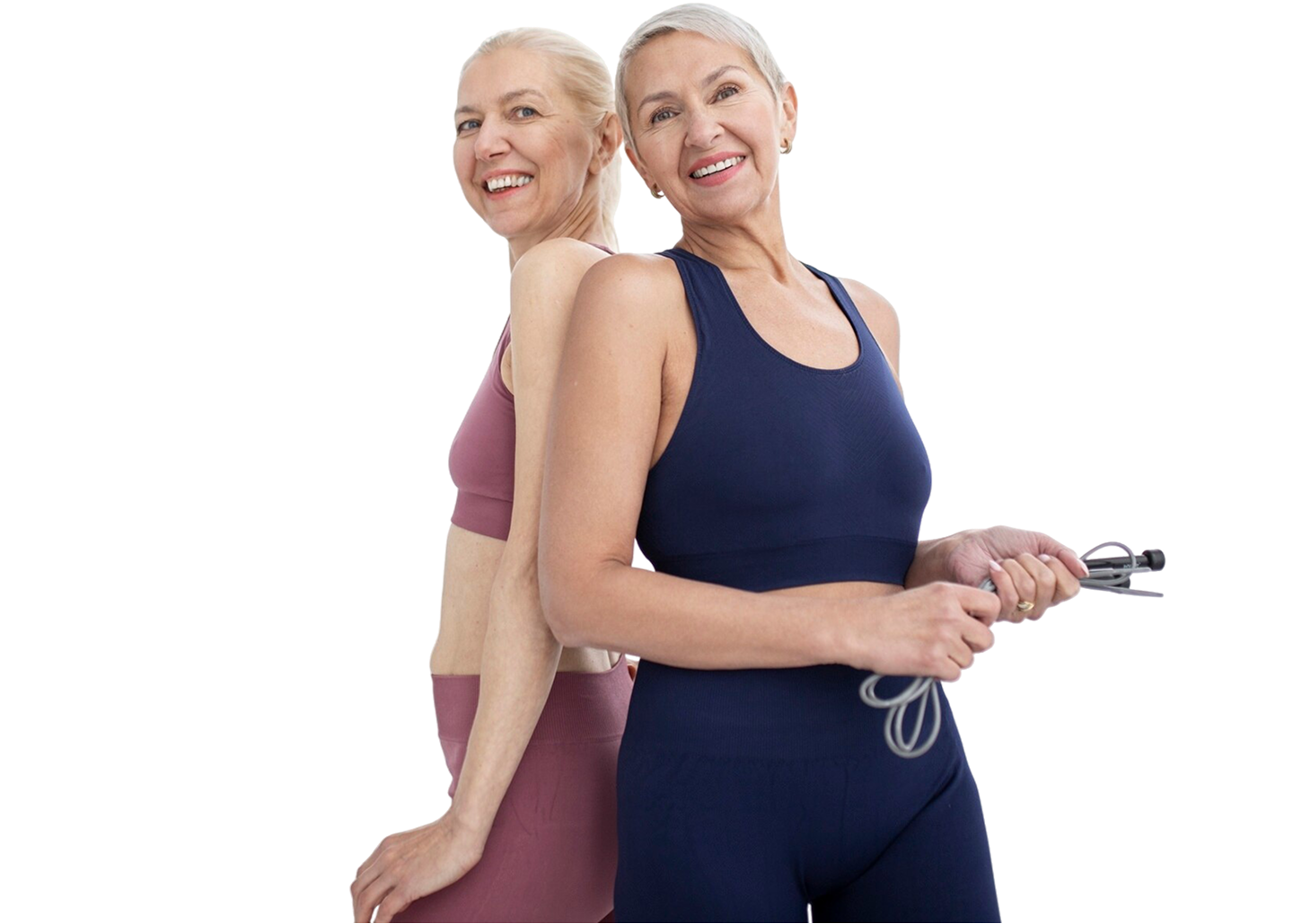 Two active senior women in fitness apparel smiling confidently after exercise, promoting healthy aging, wellness, strength, and an active lifestyle