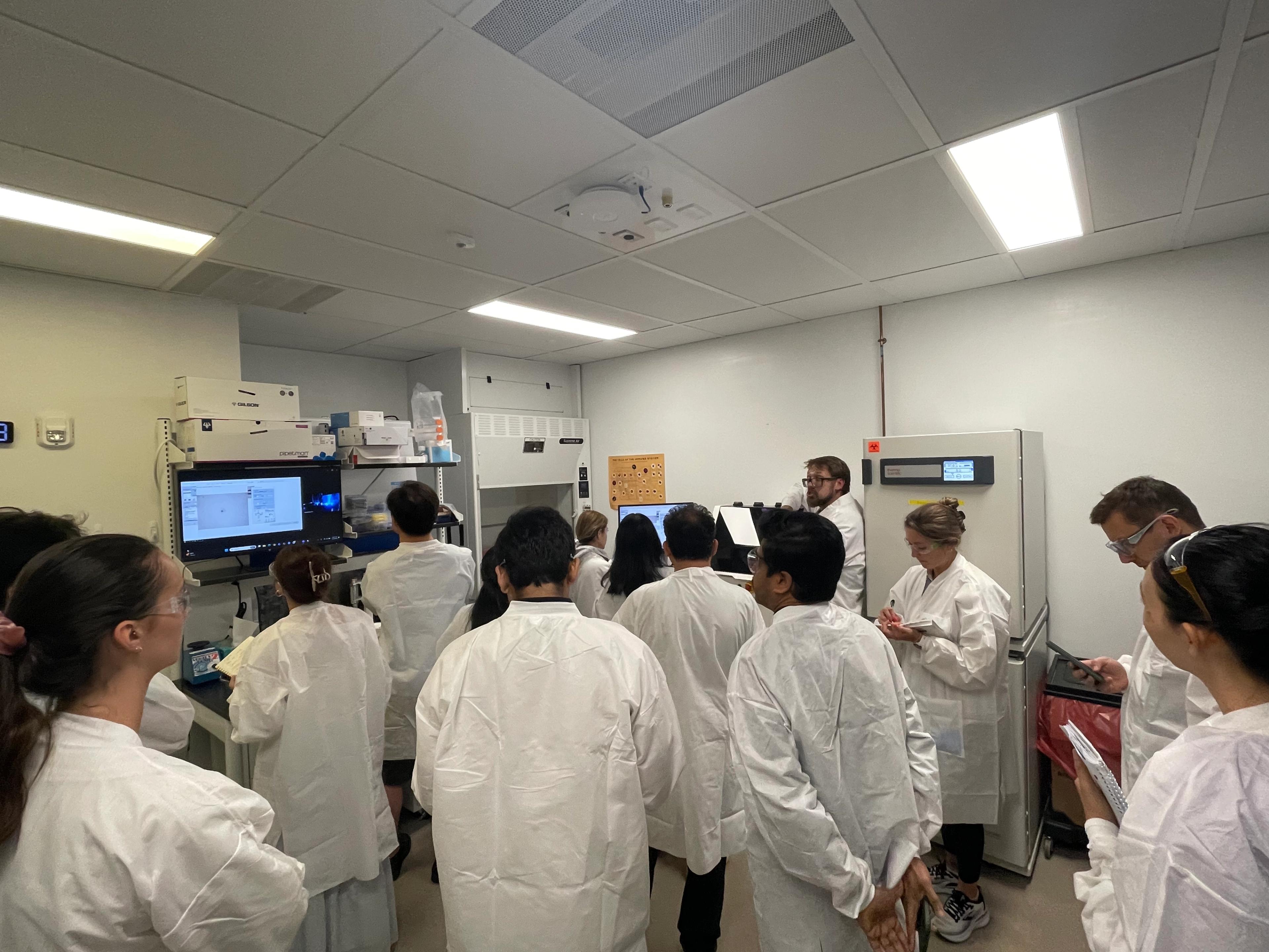 Josh Cantlon, joined by PTI's Lina Warinner, walks participants through  sample preparation with the cellenONE.