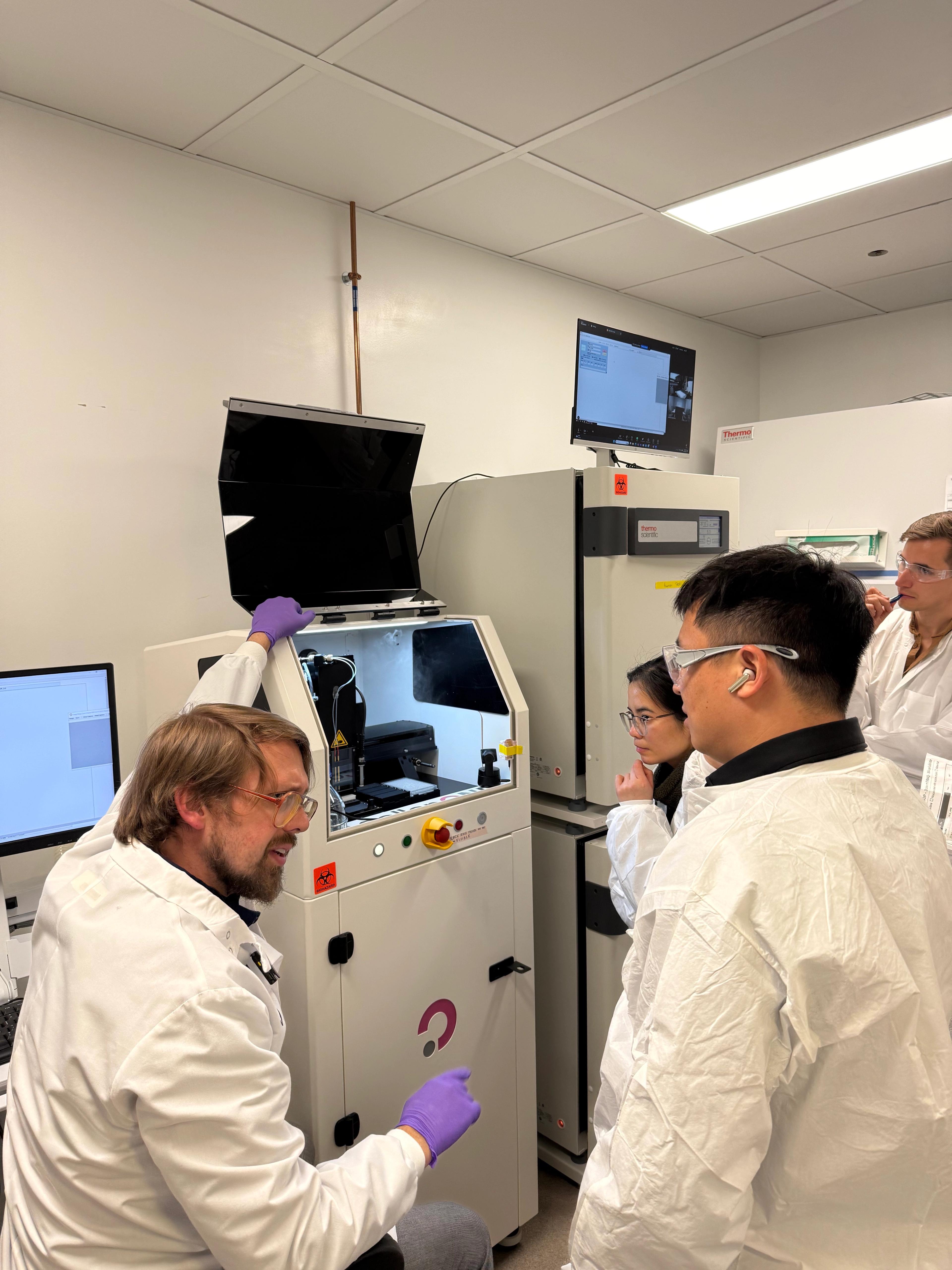 Josh Cantlon walks participants through sample preparation with the cellenONE.