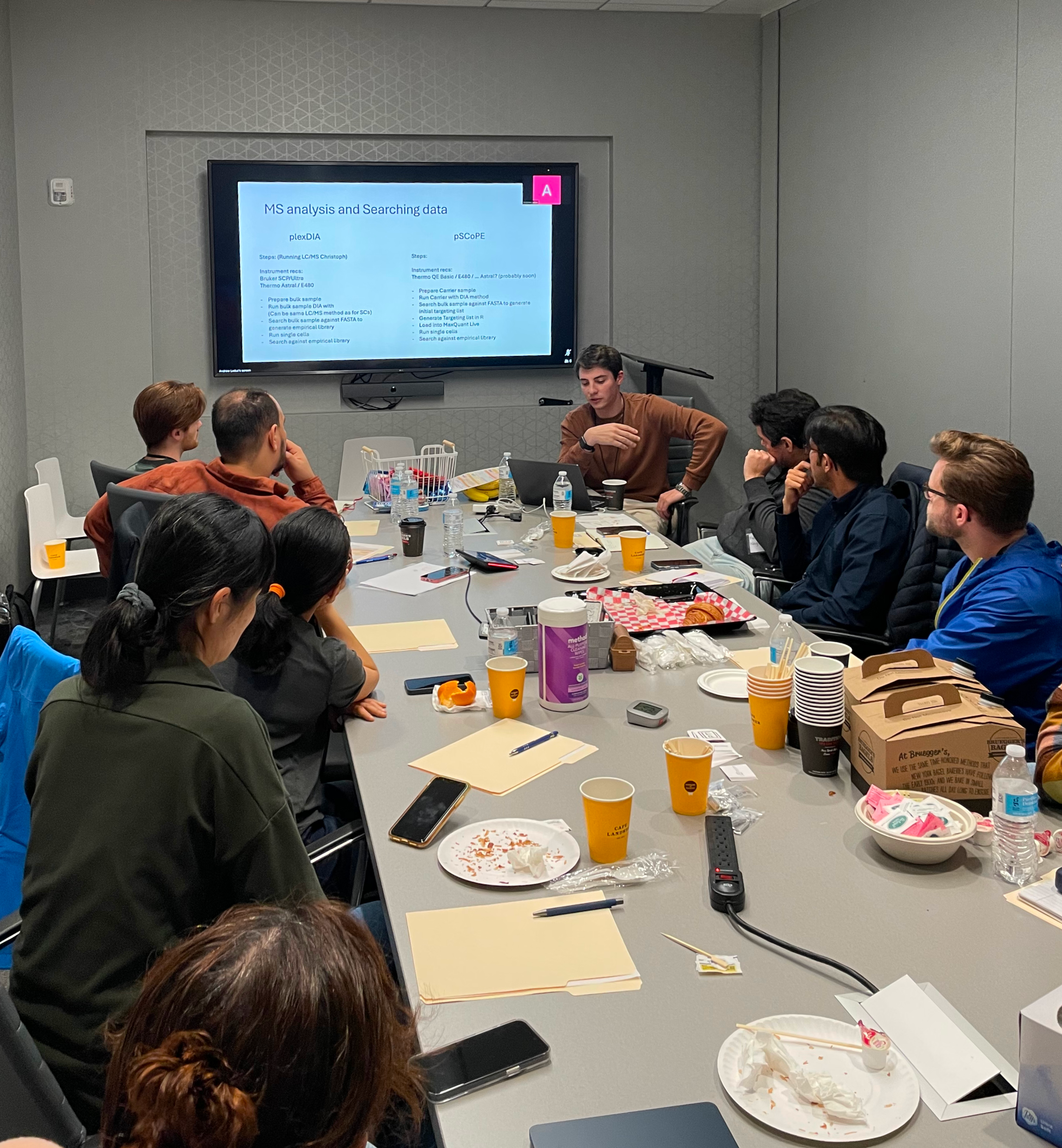 Andrew Leduc (top right) leads participants during the data analysis section of the workshop.