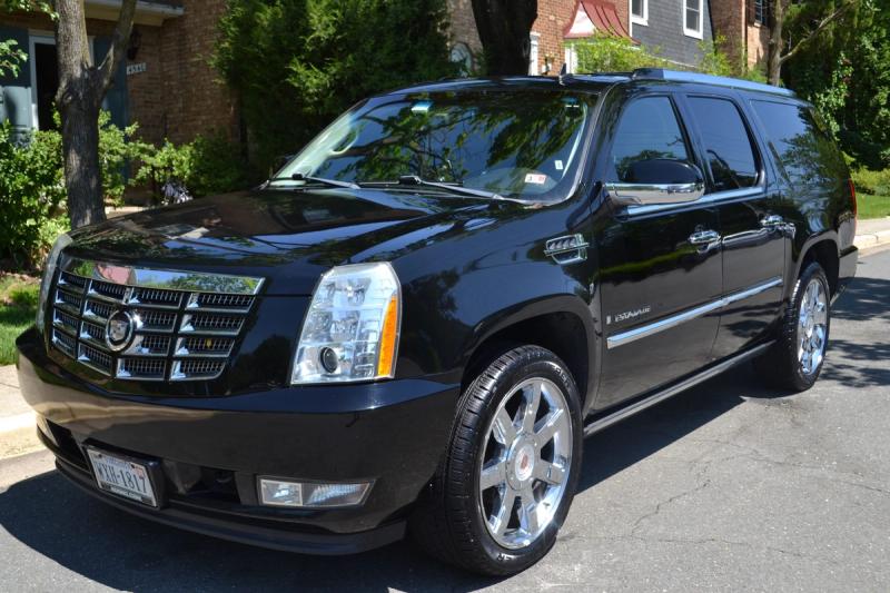 Same vehicle interior after deep detail with steam-cleaned carpet shampooed seats and conditioned trim