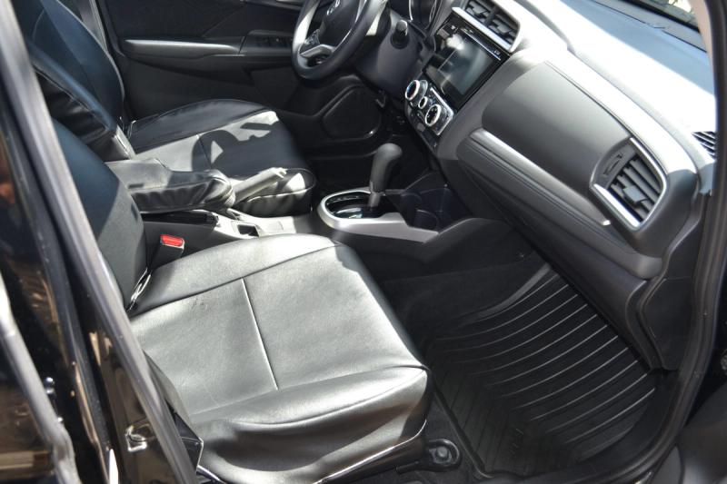 Same black sedan exterior after Platinum Detail with full paint correction and Jet Seal paint sealant