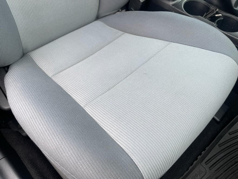 Same vehicle spot after targeted detail with stain removed and surface restored to surrounding finish
