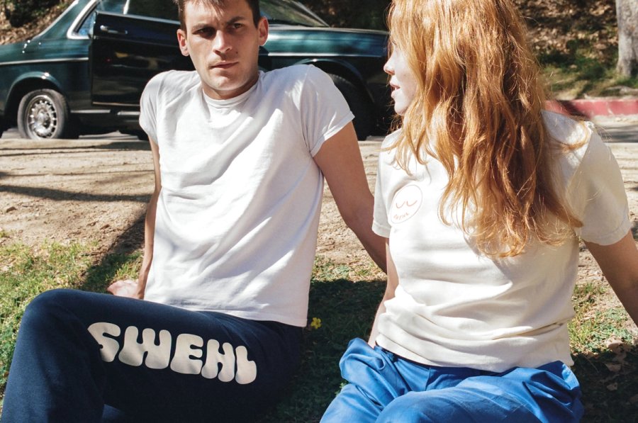 a man and a woman sitting next to each other