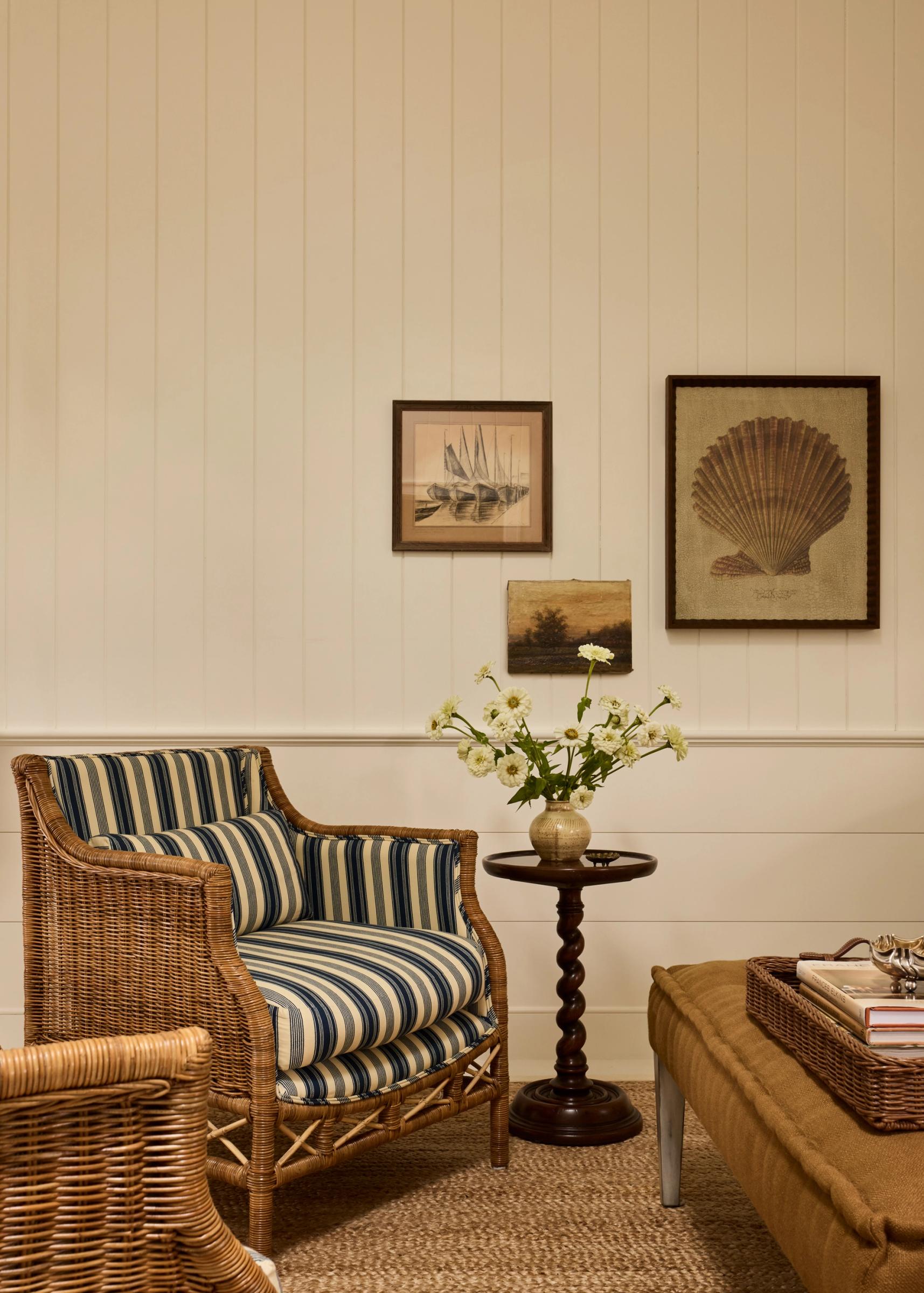 Wicker chair with blue and white striped fabric