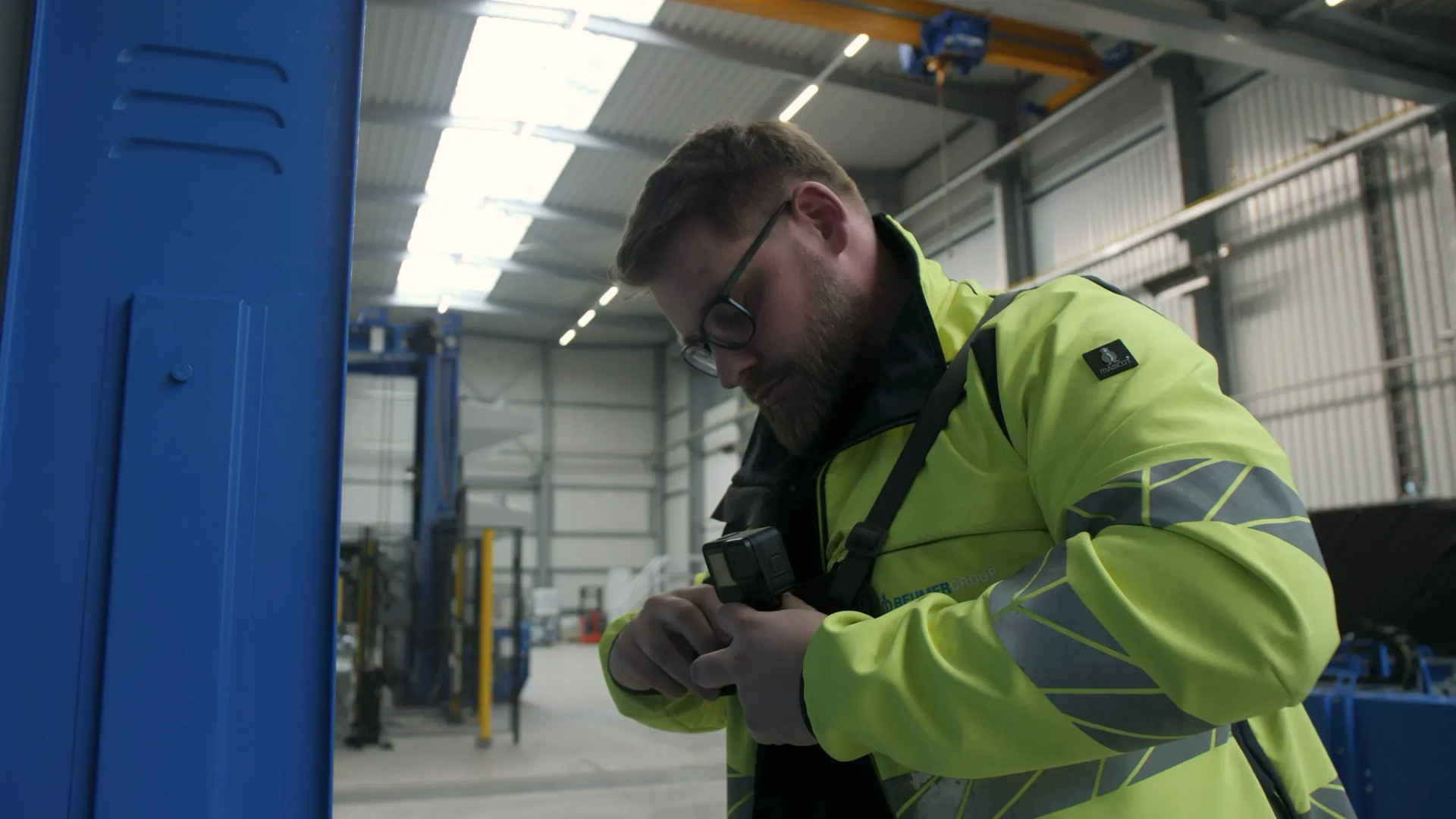 Technician working on industrial machinery