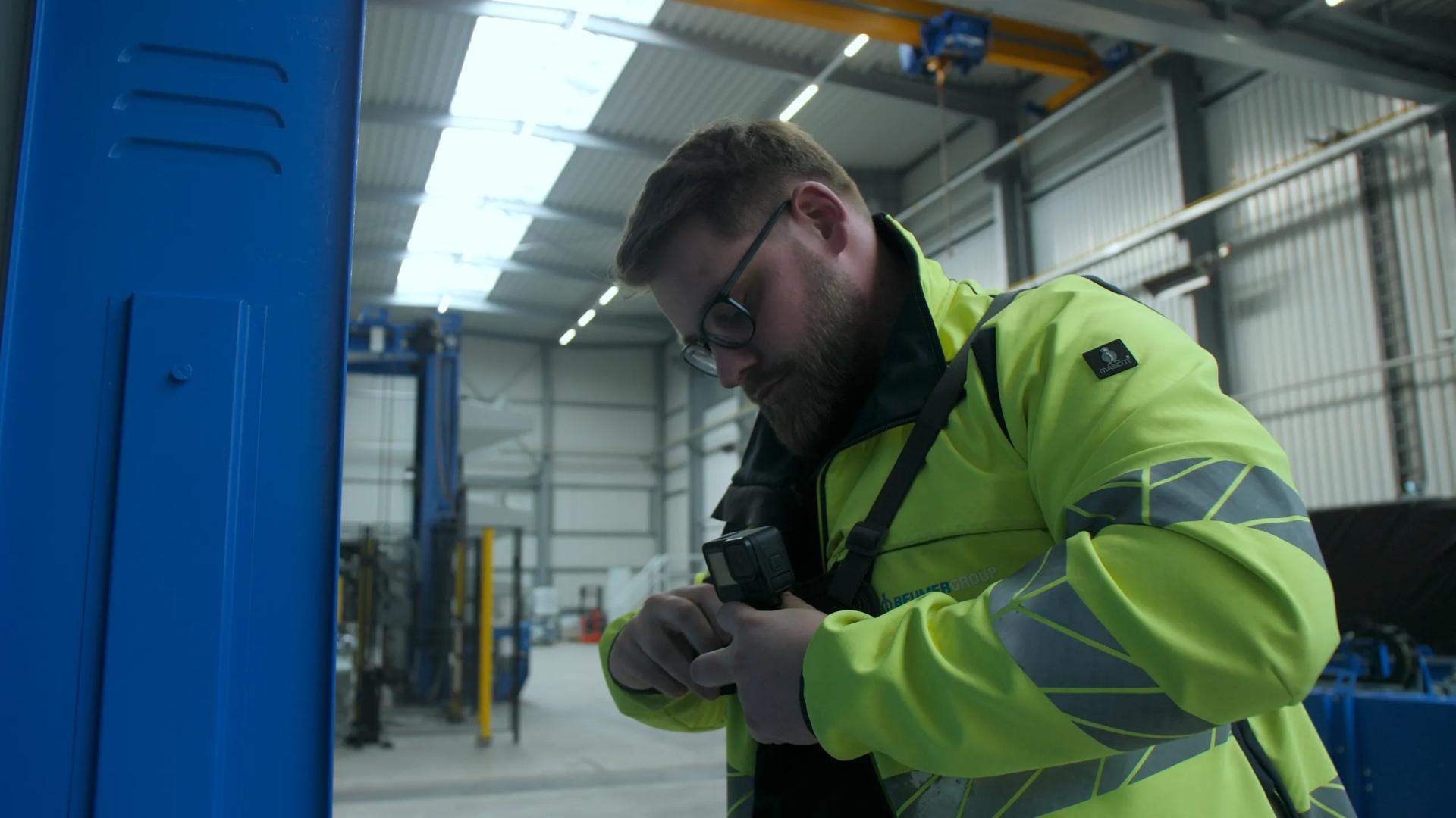 Technician working on industrial machinery