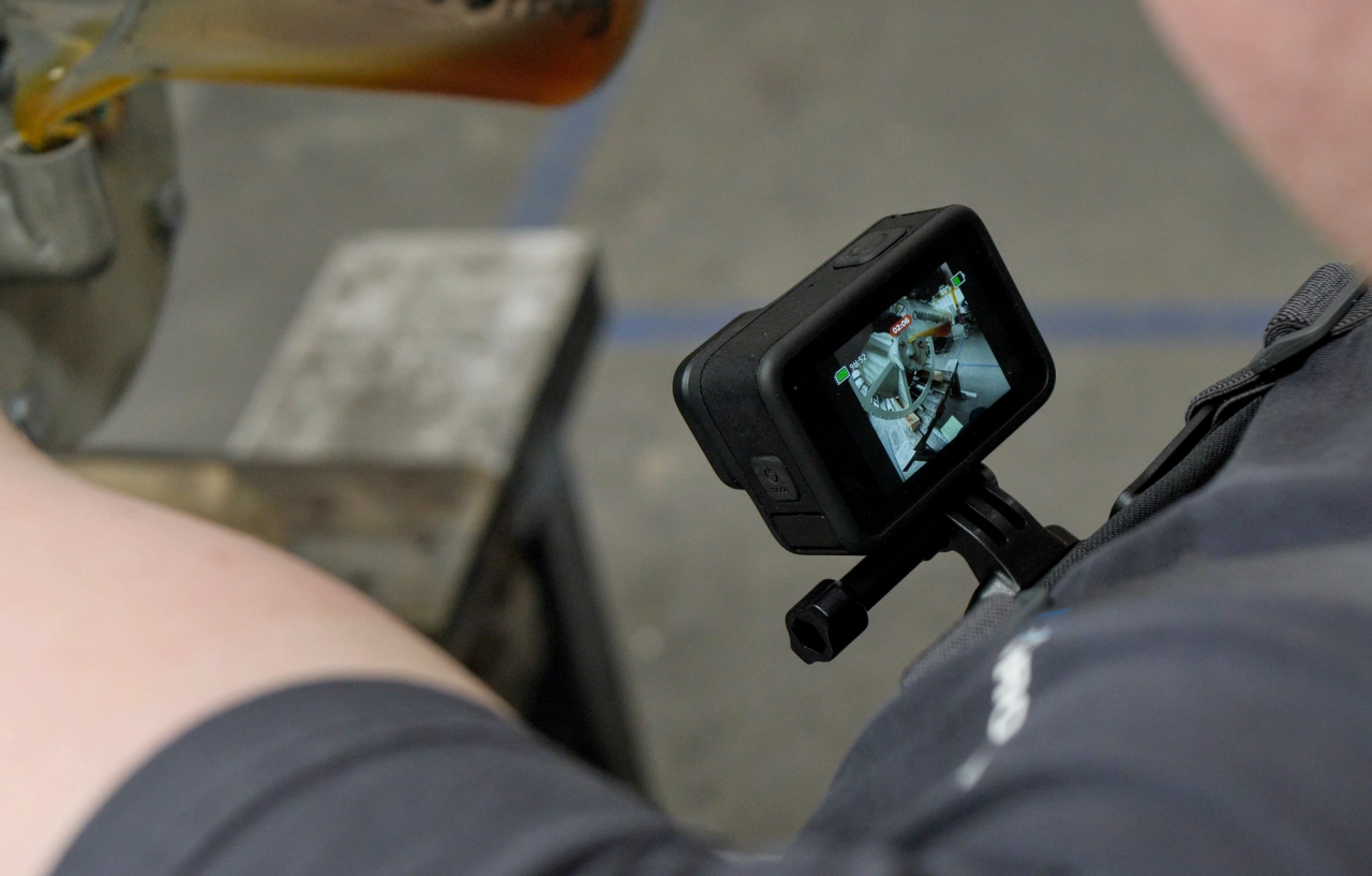 Shop-floor worker wearing an Action Camera on a chest mount