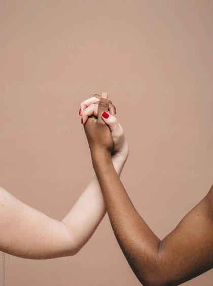 two people holding hands