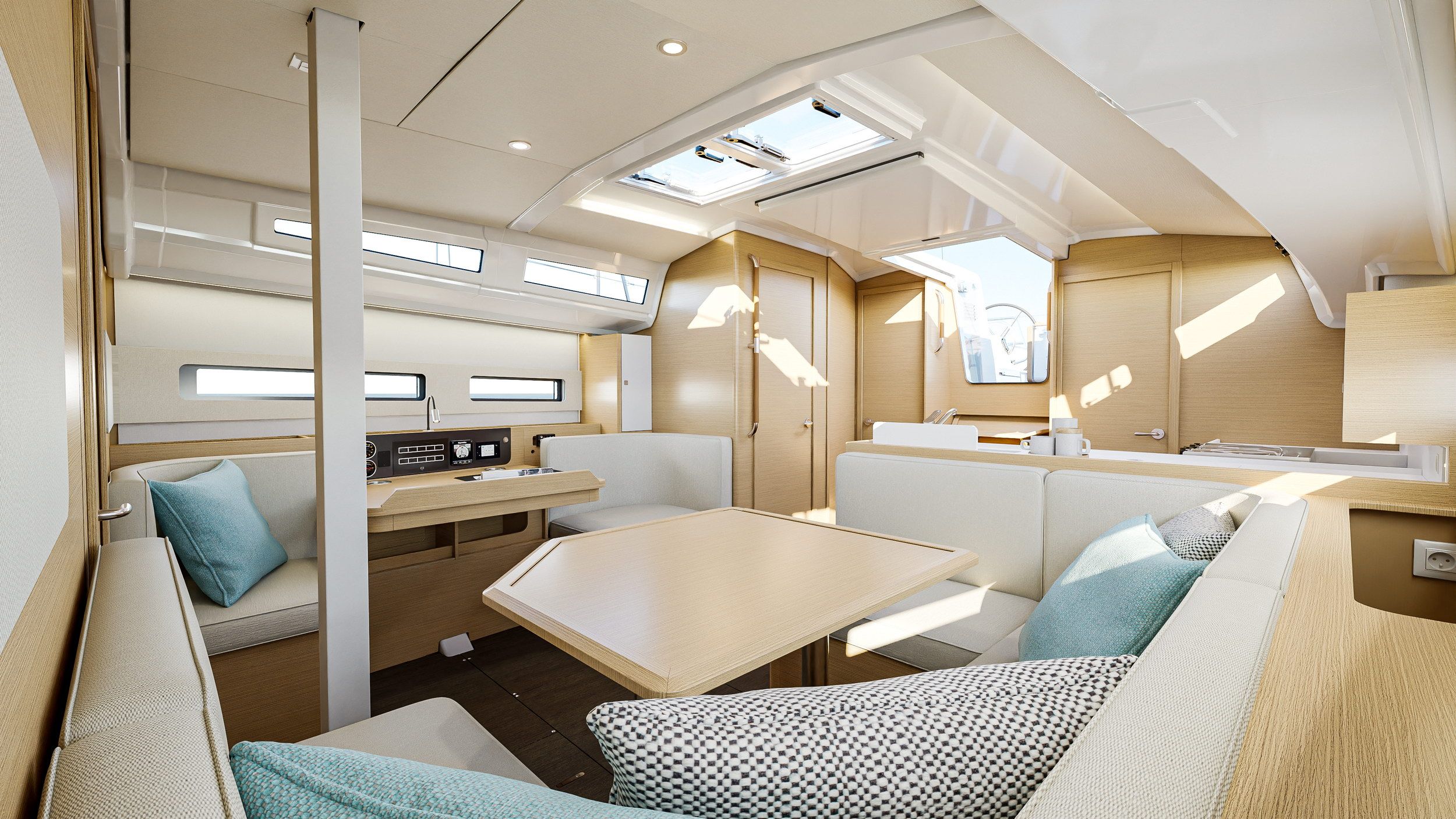 Jasne wnętrze salonu jachtu Jeanneau Sun Odyssey 415 z beżowymi kanapami, drewnianym stołem i oknami bocznymi.
