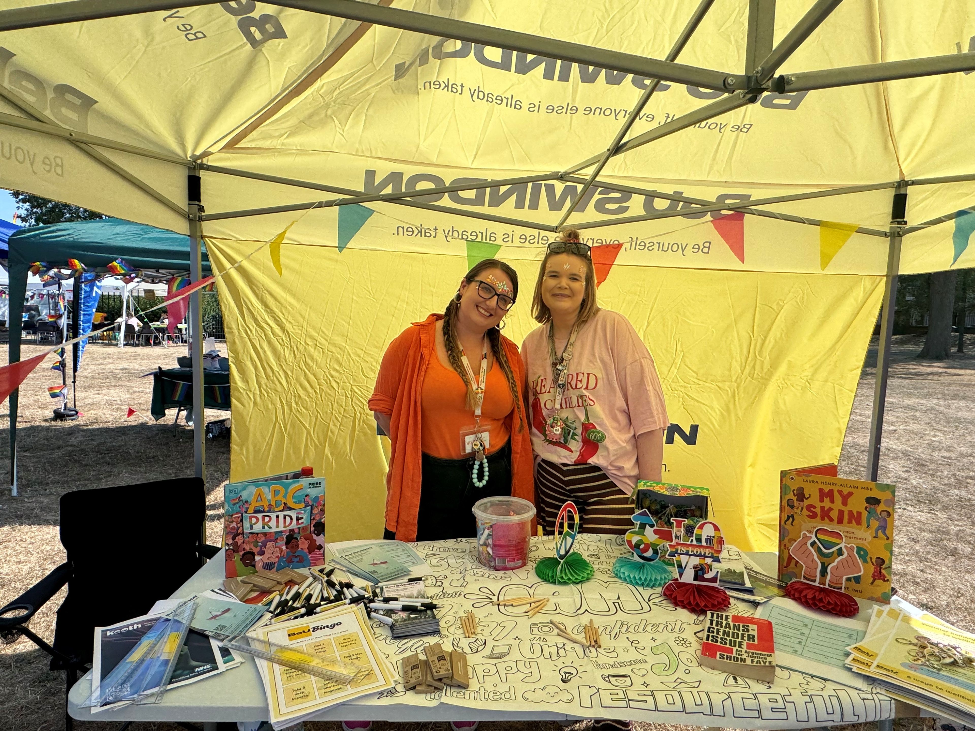 Our team on the BeU Swindon stall at GWR Park, Swindon & Wiltshire Pride 2026
