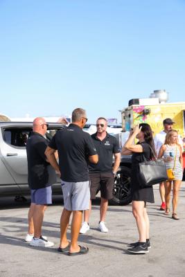 Guests networking at The Triton's Crew, Captains & Connections event at Nautical Ventures Marina.