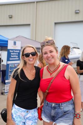 Guests networking at The Triton's Crew, Captains & Connections event at Nautical Ventures Marina.