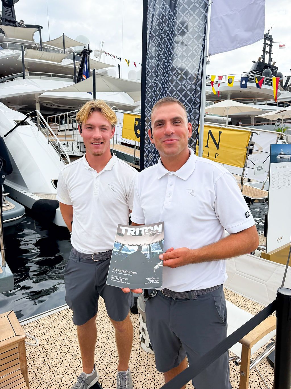 Yachts and crew on the docks at the 2026 Monaco Yacht Show in Port Hercule, Monaco.