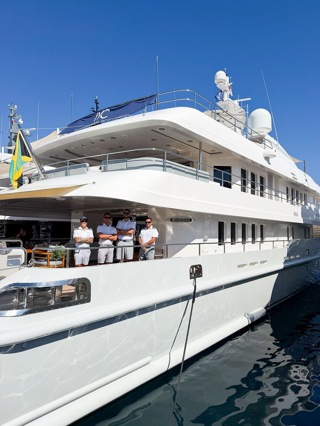 Yachts and crew on the docks at the 2026 Monaco Yacht Show in Port Hercule, Monaco.