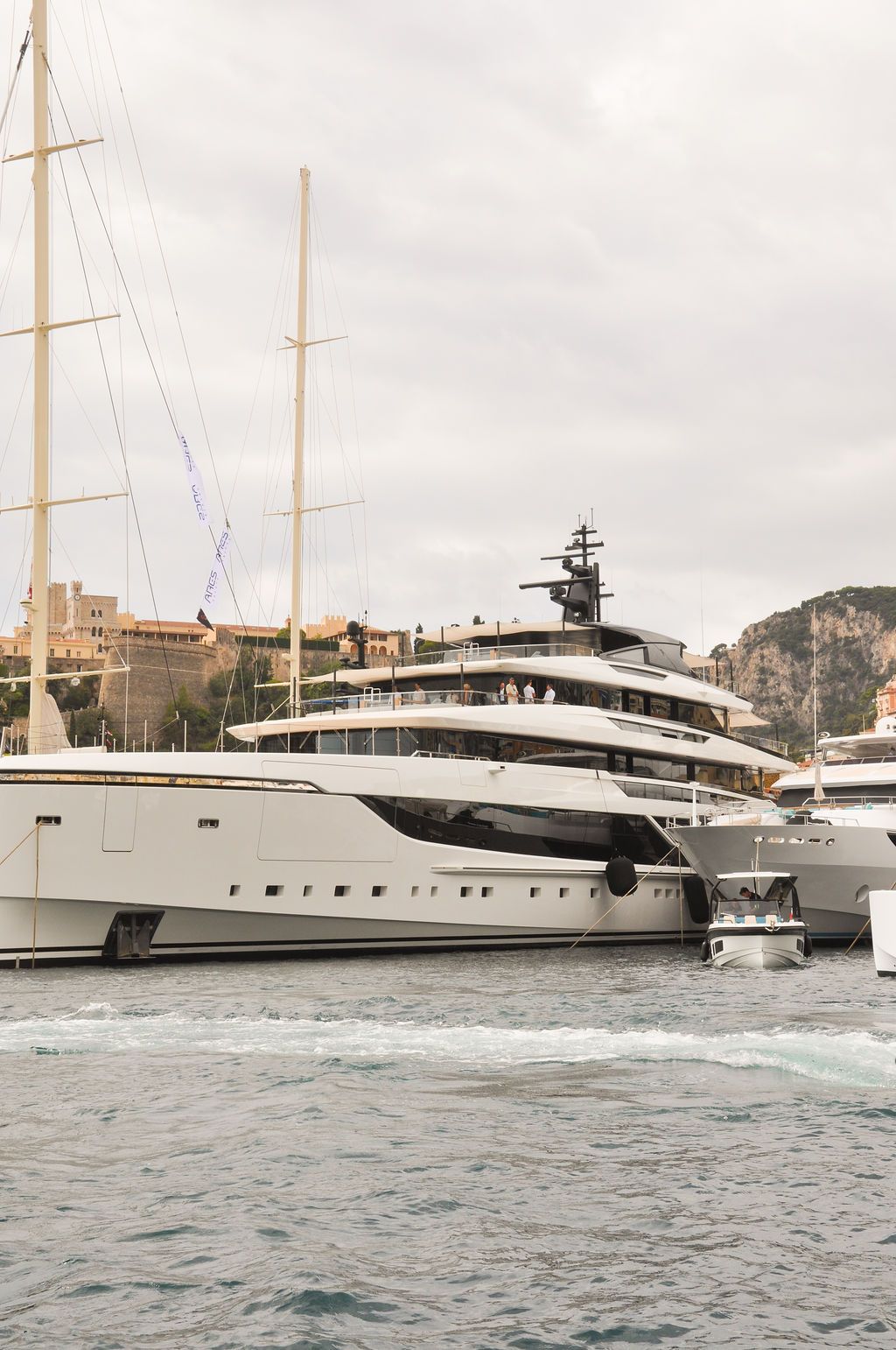 Yachts and crew on the docks at the 2026 Monaco Yacht Show in Port Hercule, Monaco.