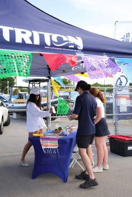 Guests networking at The Triton's Crew, Captains & Connections event at Nautical Ventures Marina.
