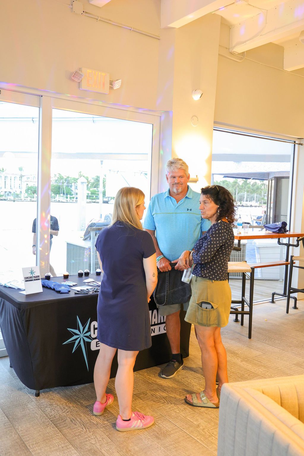 Guests and exhibitors at The Triton's Fall Triton Expo at Bahia Mar Yachting Center.