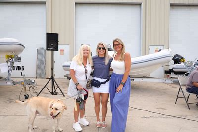 Guests networking at The Triton's Crew, Captains & Connections event at Nautical Ventures Marina.
