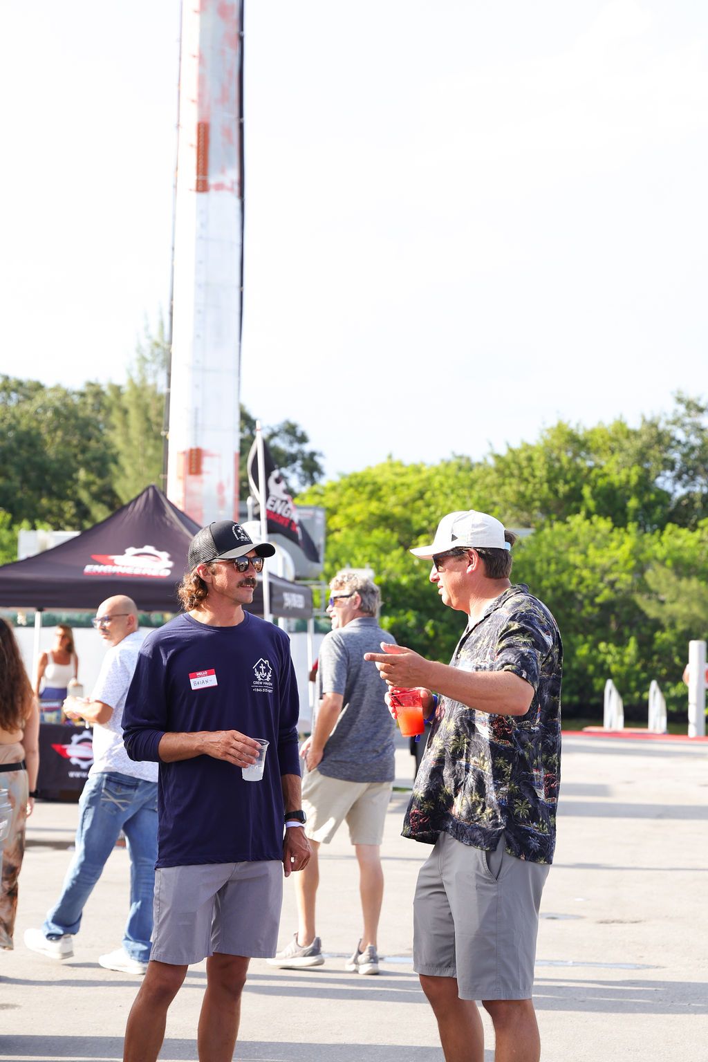 Guests networking at The Triton's Crew, Captains & Connections event at Nautical Ventures Marina.